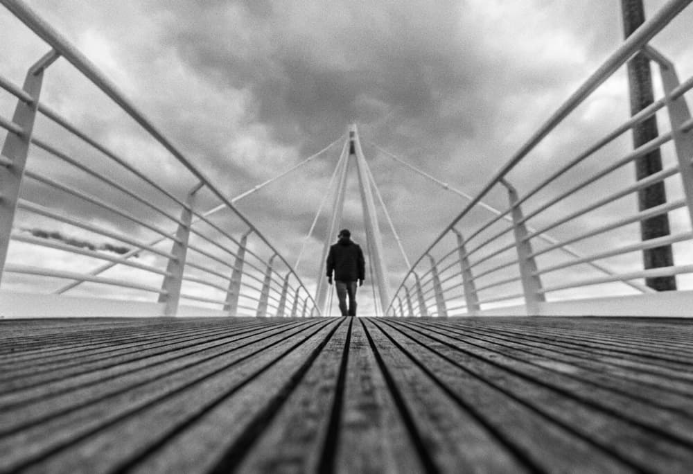 Man on Modern Bridge by Fernando Abreu — canvas wall art