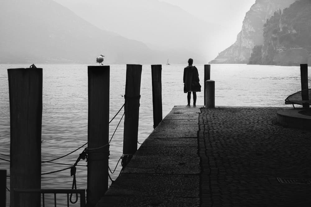 Solitary Figure by the Lake by Alexander Jikharev — canvas wall art
