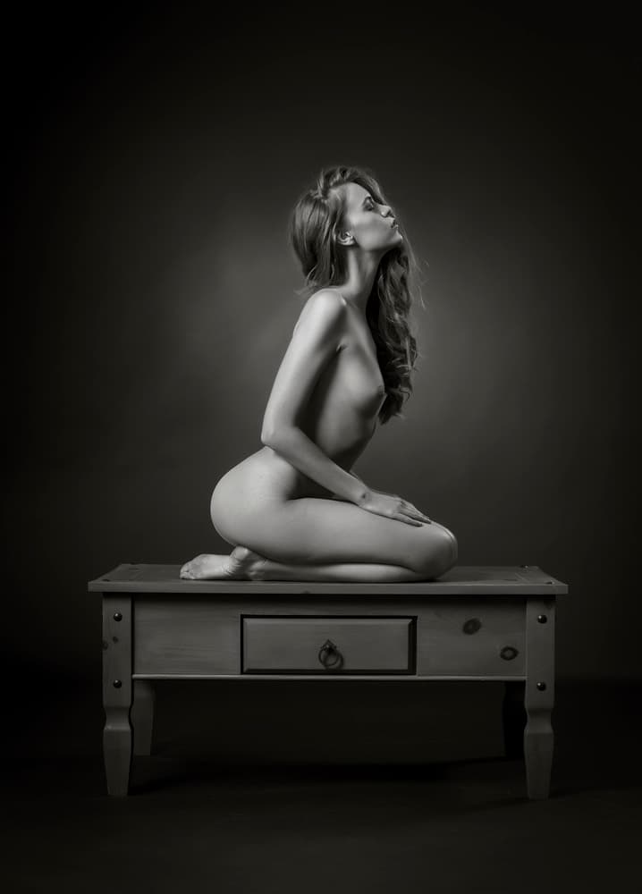 Graceful Nude on Table by Catchlight Studio — canvas wall art