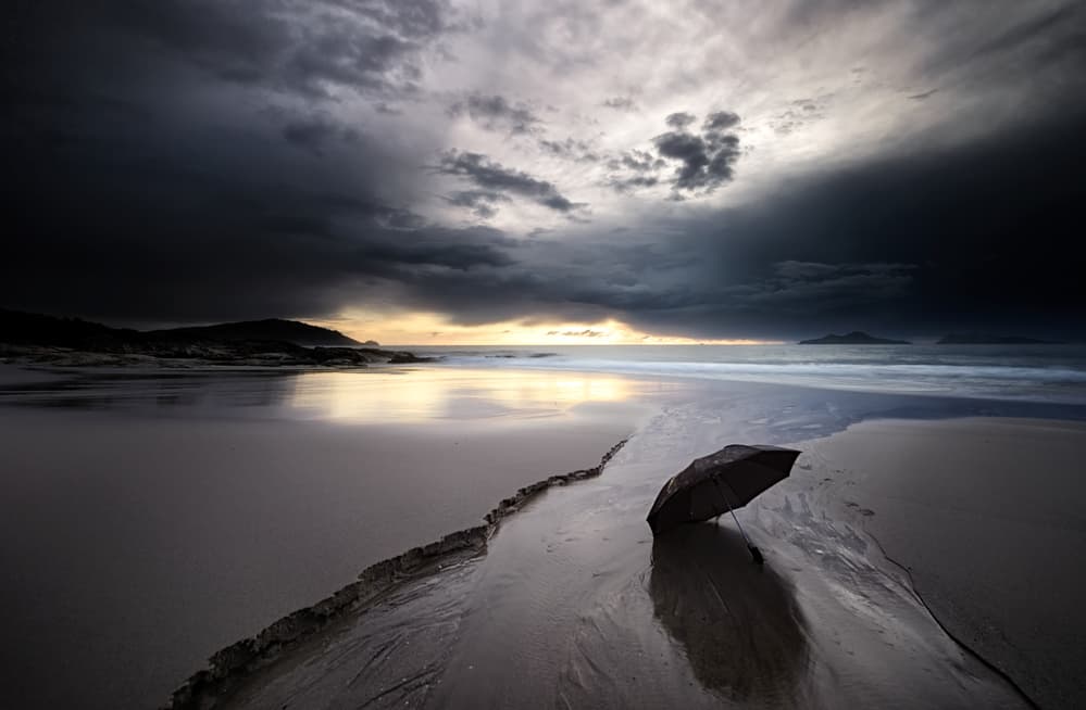 Dramatic Beach Umbrella by Santiago Pascual Buye — canvas wall art
