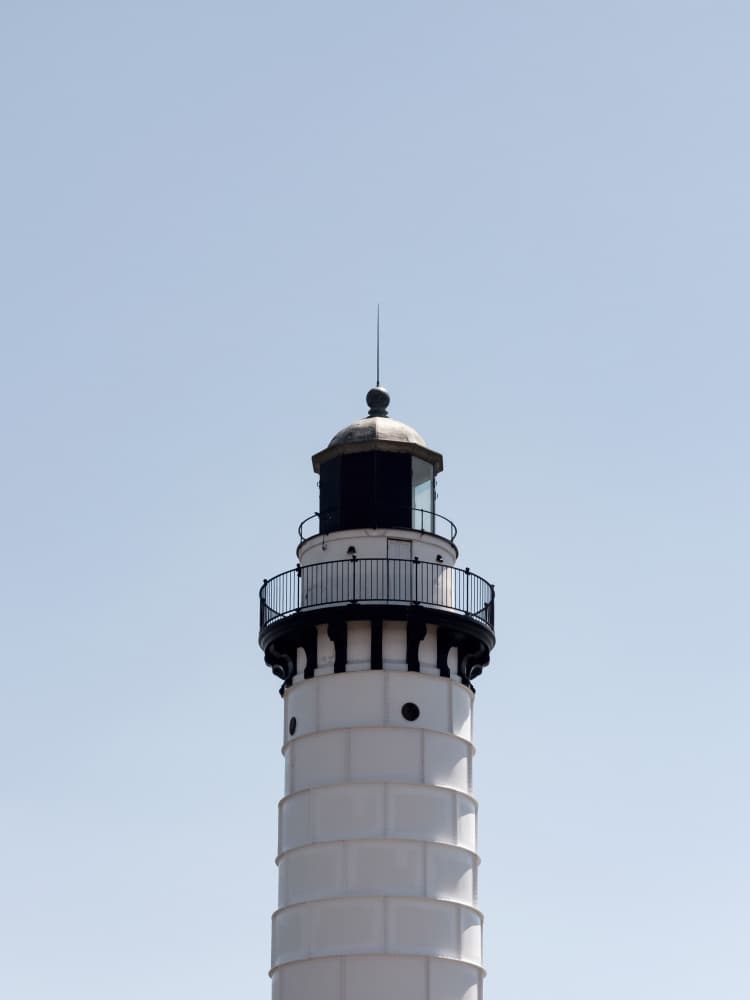 Lighthouse Under Blue Sky by Stephanie Klatt — canvas wall art