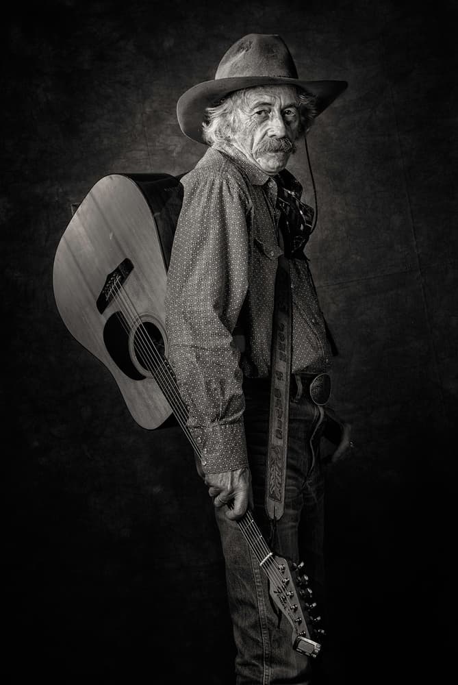 Cowboy Guitarist Portrait by Catchlight Studio — canvas wall art