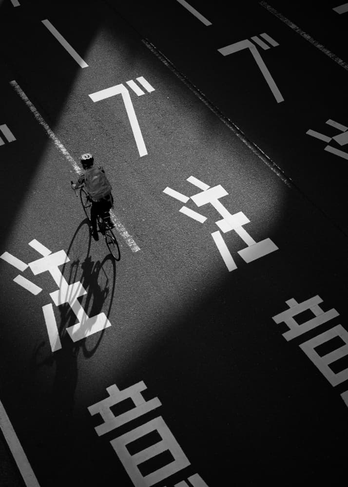 Japanese Road Cyclist by Satoshi Hata — canvas wall art