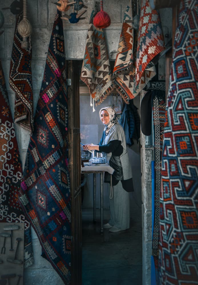 Smiling Textile Artisan by Frank Ma — canvas wall art