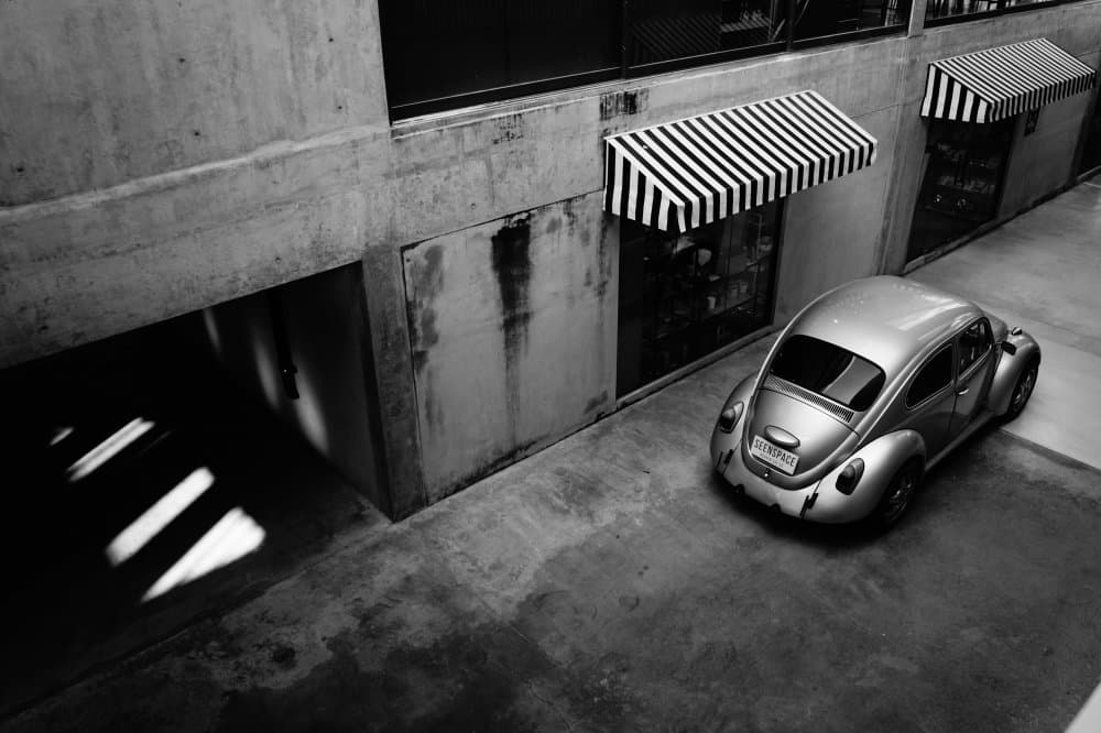 Vintage Beetle Urban Scene by Wille Roos — canvas wall art