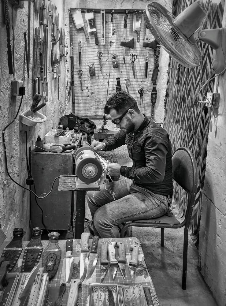 Workshop Grinding Sparks by Bashar Alsofey — canvas wall art