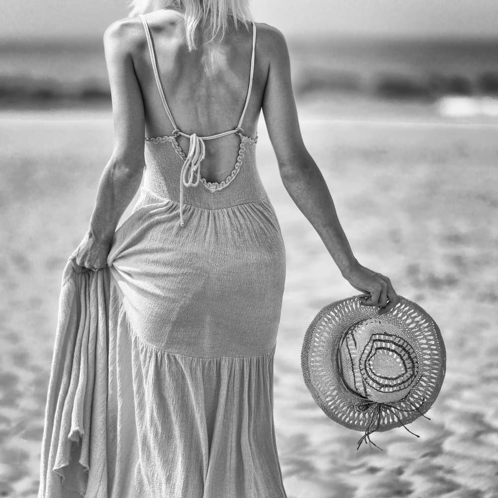 Coastal Woman With Hat by Piet Flour — canvas wall art