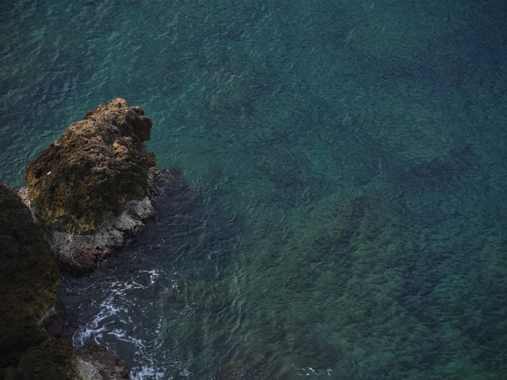 Turquoise Ocean Rocks by engin akyurt — canvas wall art