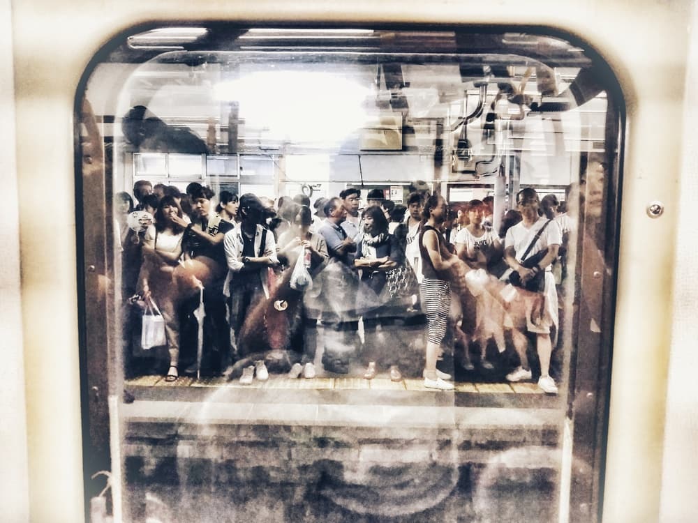 Commuters Through Window by Twenty Eight — canvas wall art