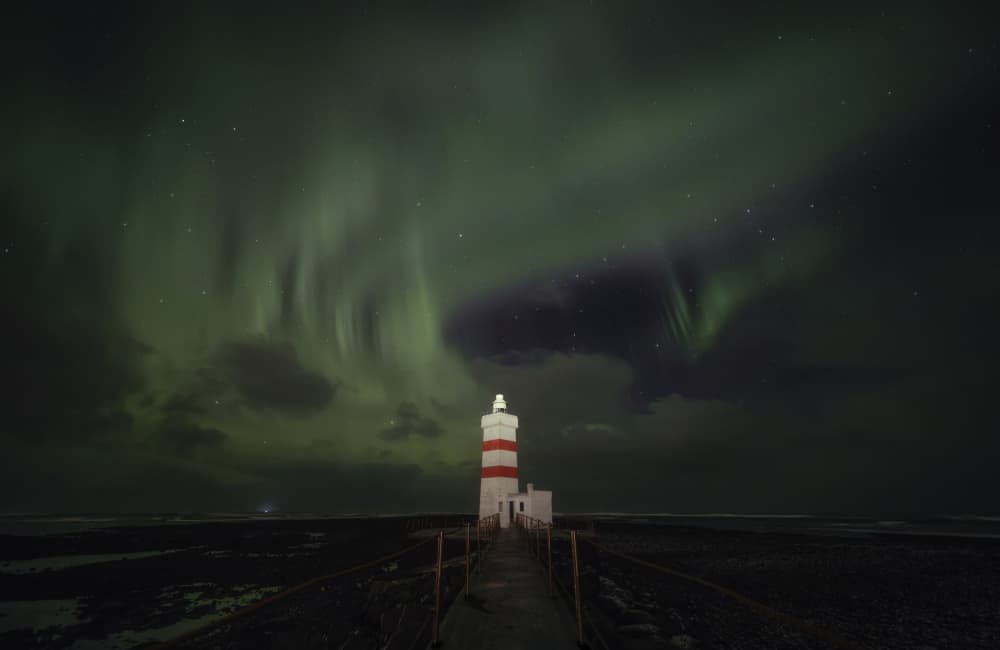 Northern Lights Lighthouse by Rodrigo Núñez Buj — canvas wall art
