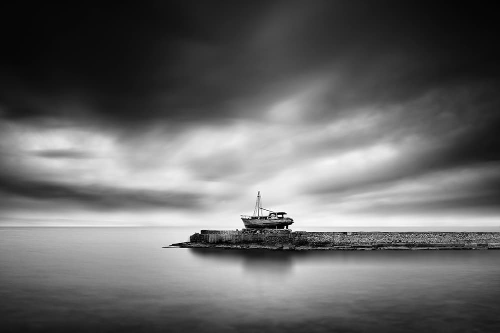 Old Boat Dark Skies by George Digalakis — canvas wall art