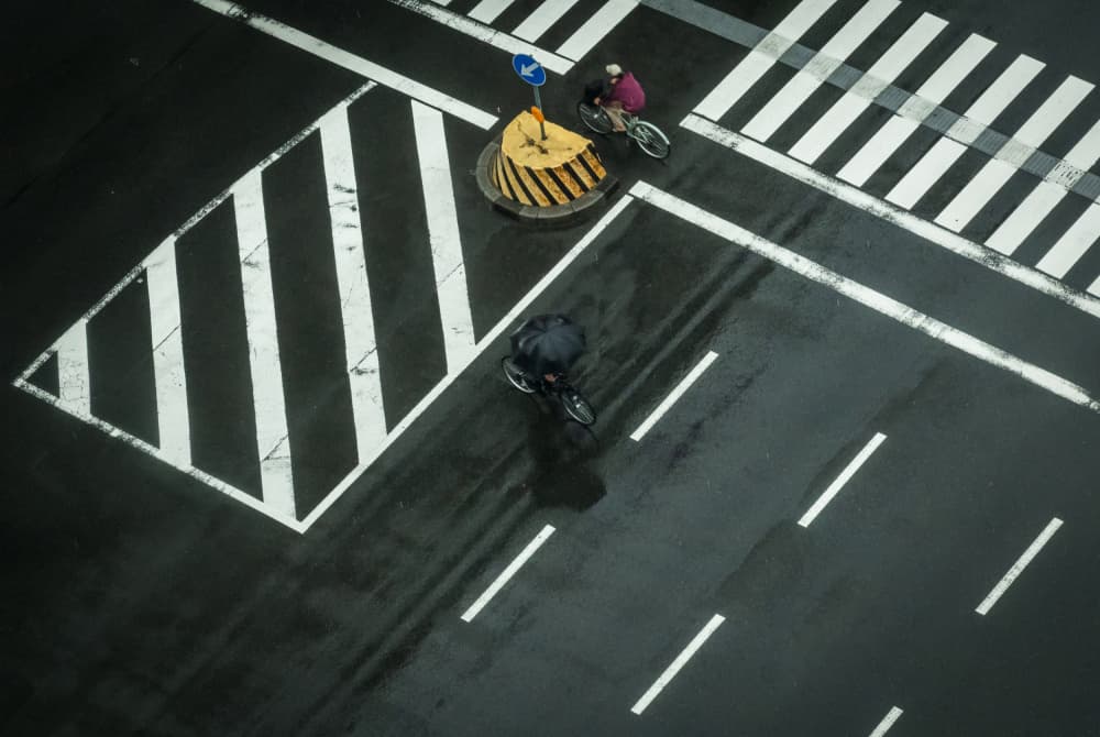 Rainy City Cyclists by Haruyo Sakamoto — canvas wall art