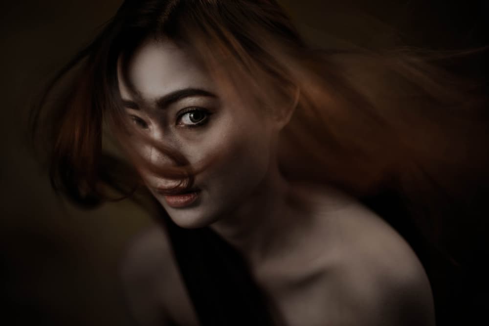 Windswept Female Portrait by Yudhistira Yogasara — canvas wall art