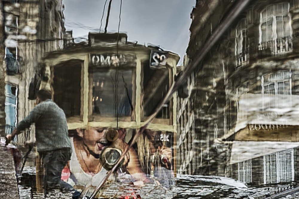 City Tram Reflection by Gabi Pontes — canvas wall art