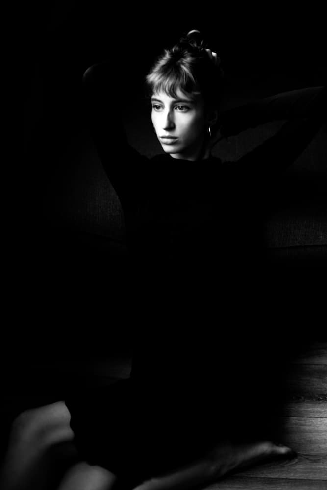 Thoughtful Woman in Shadows by Lorna Kijurko — canvas wall art