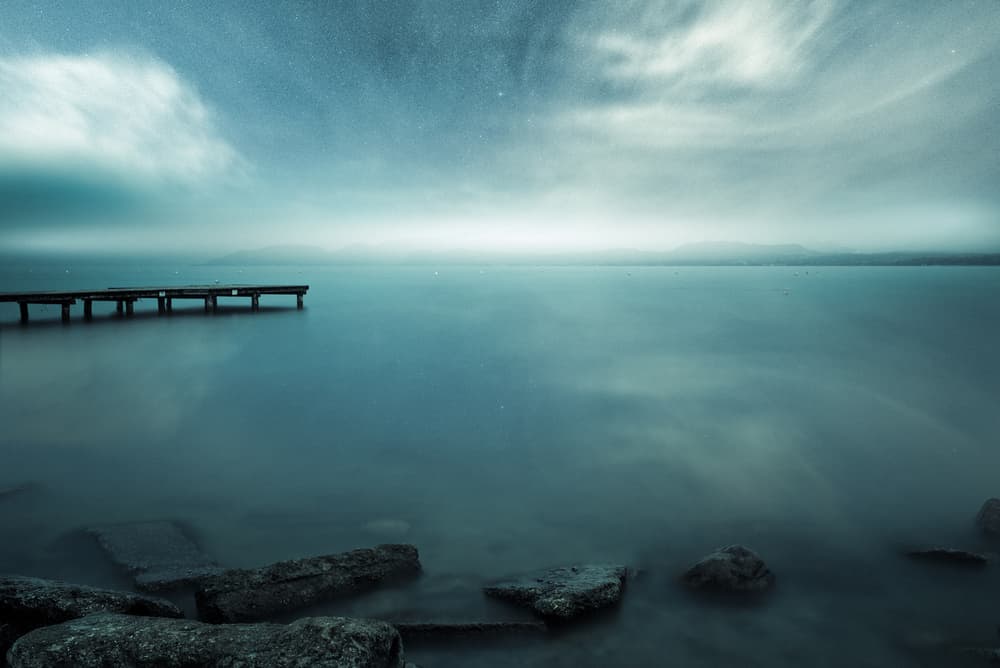 Serene Lake Pier by Andrea Fraccaroli — canvas wall art