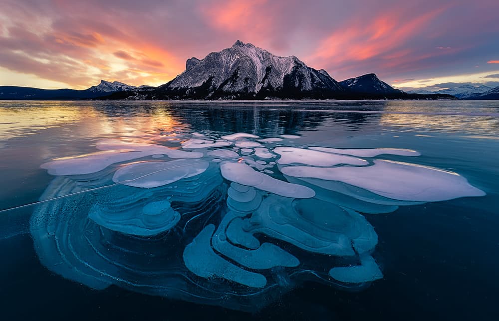 Ice Bubbles Mountain Sunset by Yimei Sun — canvas wall art