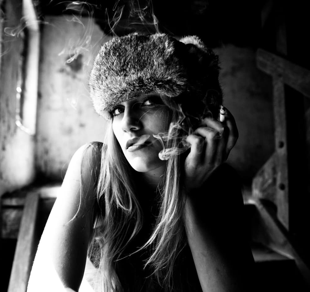Moody Woman Fur Hat by Erkan Camlilar — canvas wall art