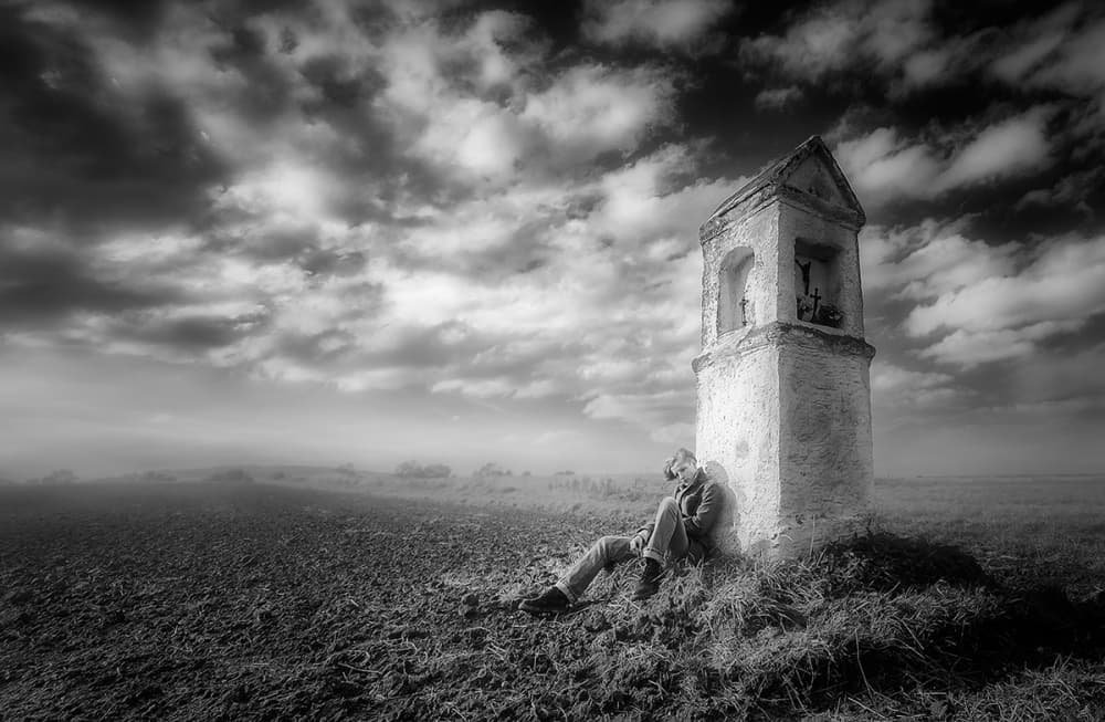 Man by Old Tower by Piotr Krol (Bax) — canvas wall art