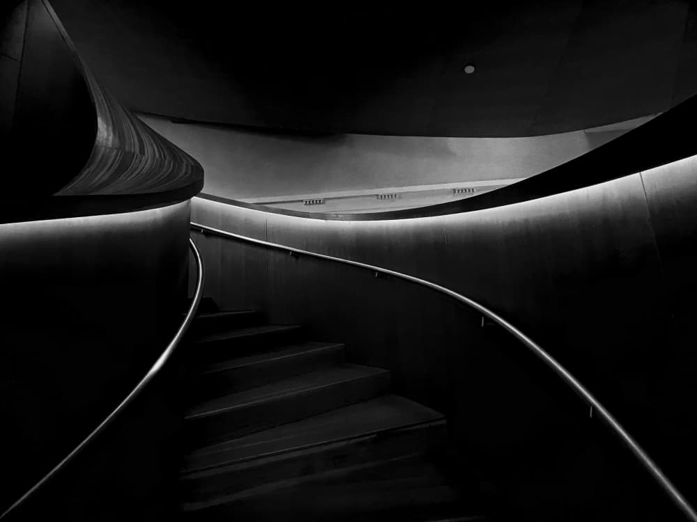 Sleek Curved Staircase by Emma Zhao — canvas wall art