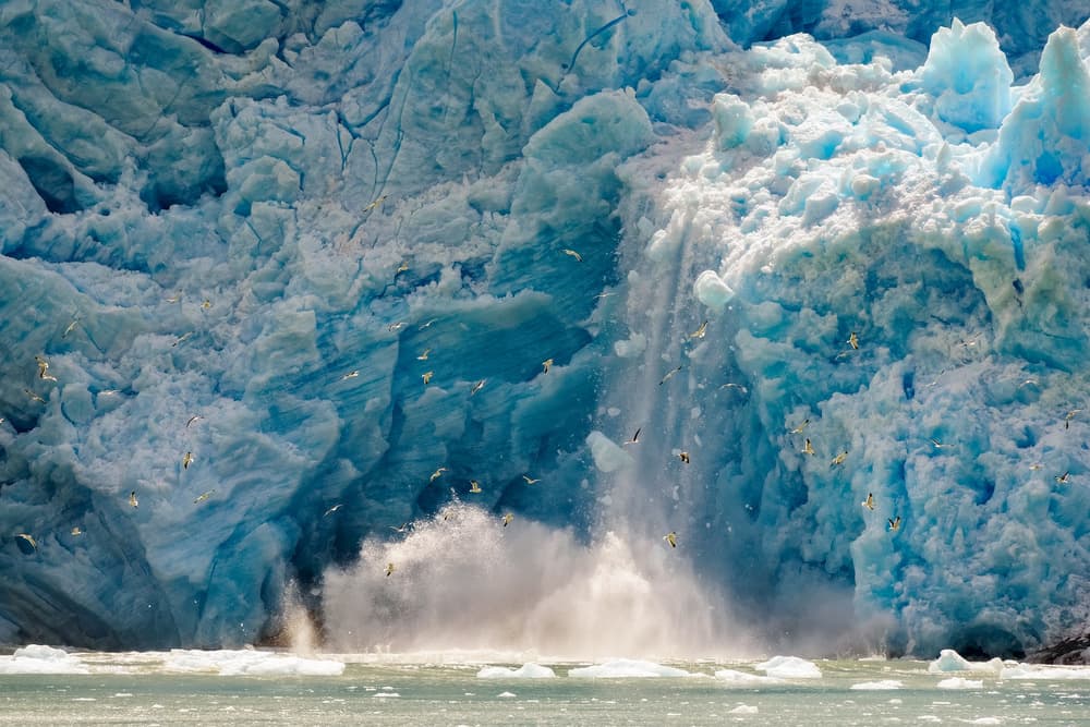 Dramatic Glacier Calving by Carlos Guevara Vivanco — canvas wall art