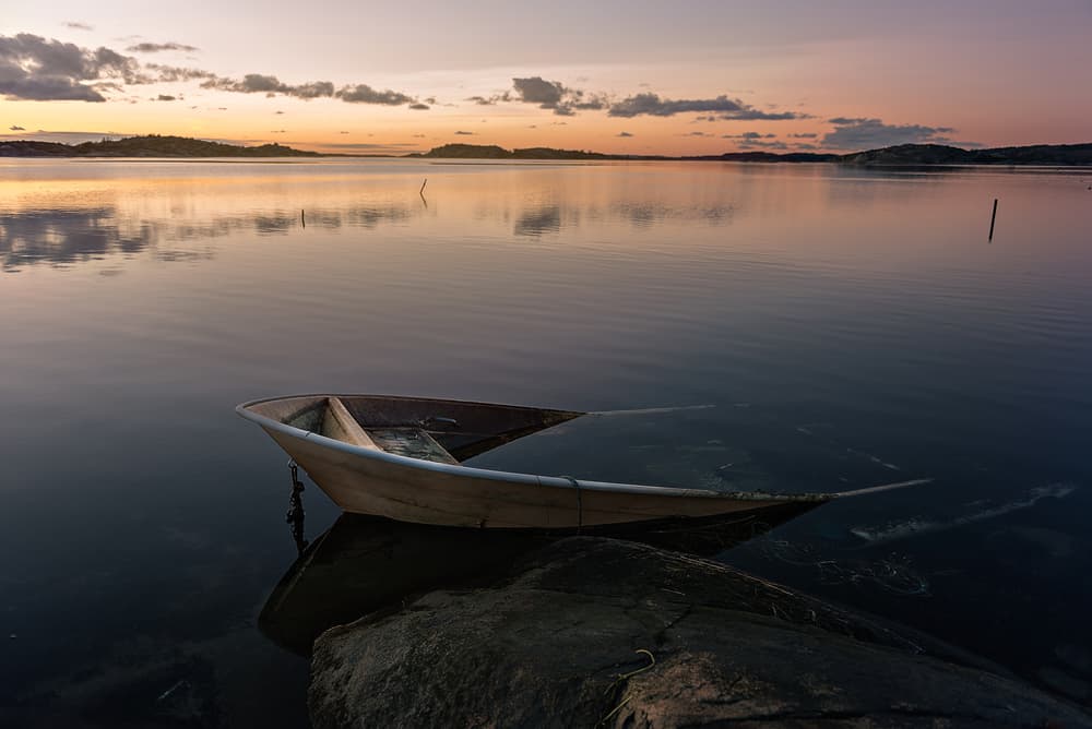 Peaceful Boat Sunset by Katarina Holmström — canvas wall art