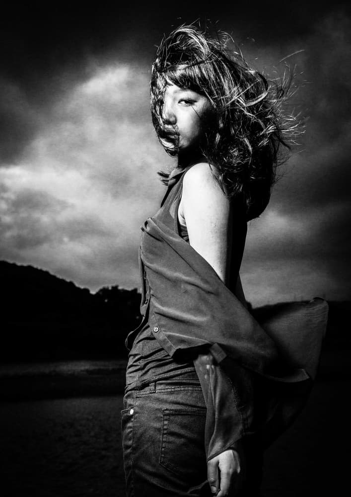 Intense Woman Stormy Sky by TORU MATSUNAGA — canvas wall art