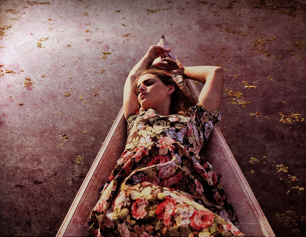 Dreamy Woman in Boat by kenp — canvas wall art