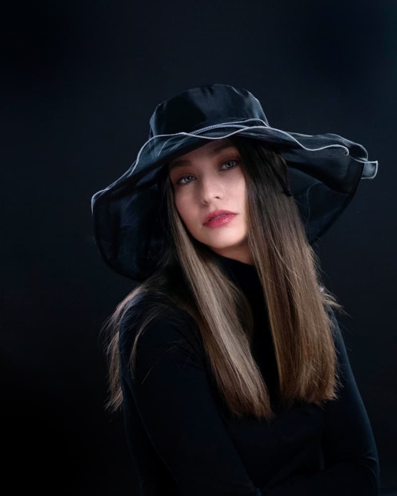 Elegant Black Hat Portrait by John Yuk Kong Chung — canvas wall art