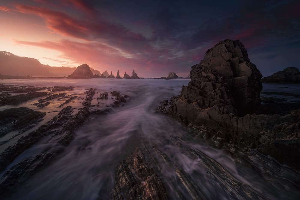 Dramatic Coastal Sunset by Carlos F. Turienzo — canvas wall art