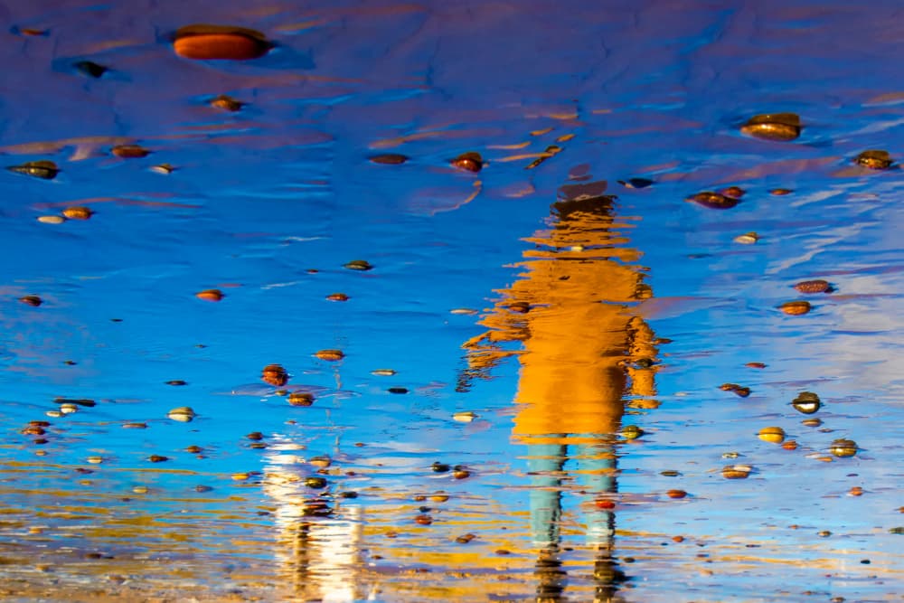 Person in Vibrant Reflection by Ilze Ozola — canvas wall art