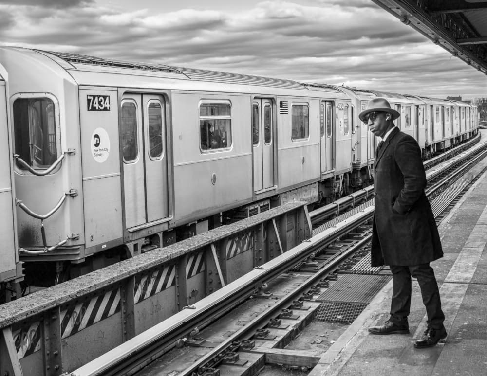Man at Subway Station by Robert Sherman — canvas wall art