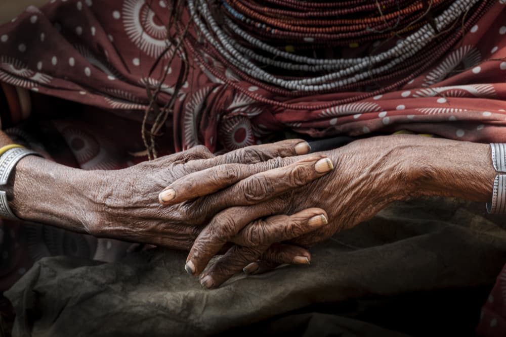 Elderly Hands of Wisdom by Elena Molina — canvas wall art