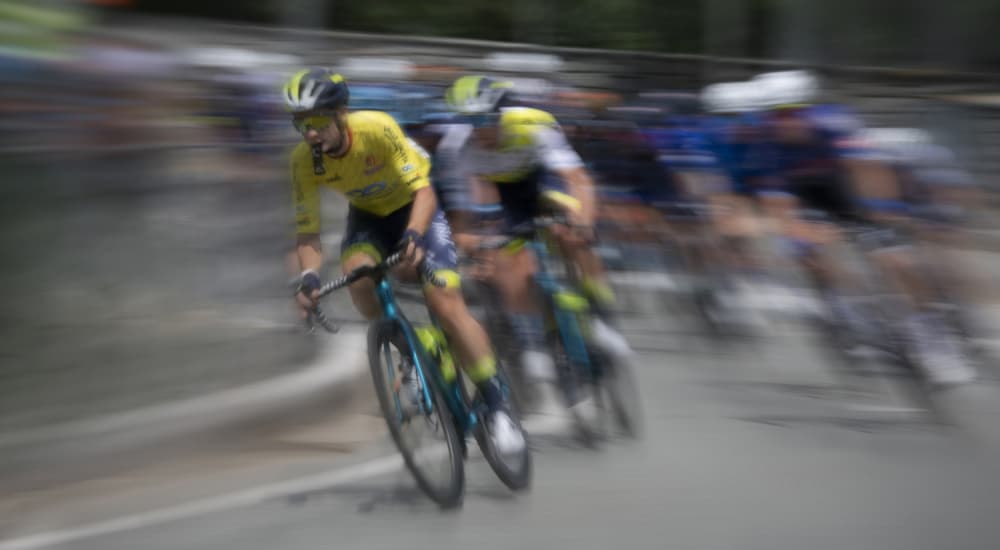 Dynamic Bike Race by Claudio Moretti — canvas wall art