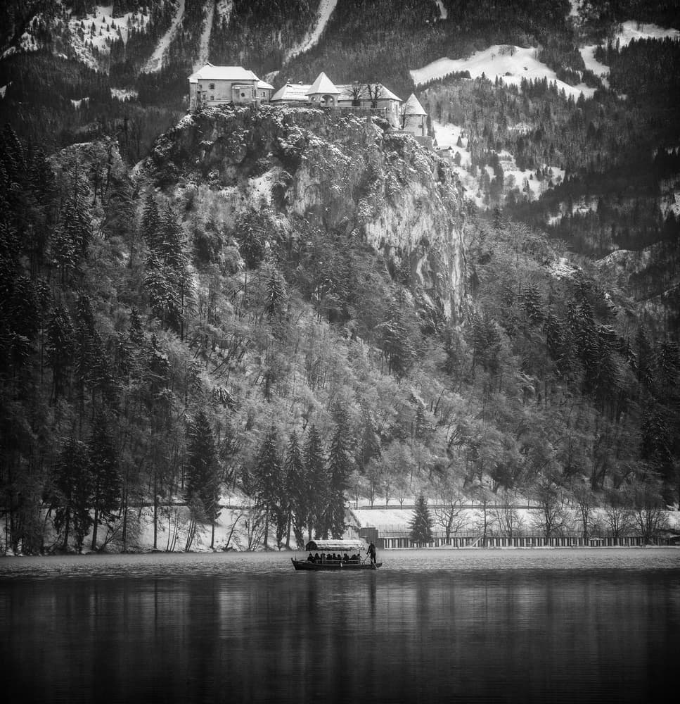 Snowy Bled Castle Lake by Ales Krivec — canvas wall art