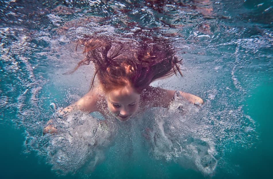 Joyful Underwater Splash by Dmitry Frizel — canvas wall art