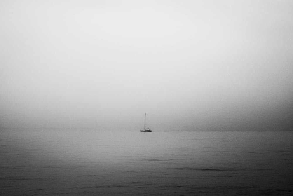 Lonely Sailboat In Fog by Monika Zemojtel — canvas wall art