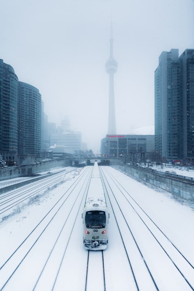 Snowy Toronto Train by Junbo Liang — canvas wall art