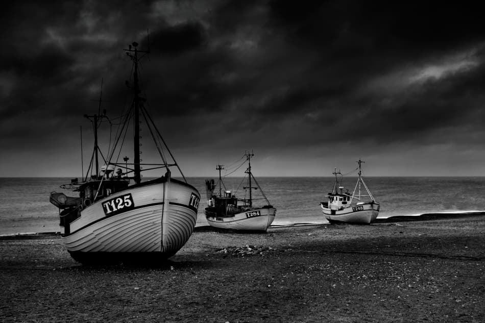 Moody Fishing Boats by Niels Christian Wulff — canvas wall art