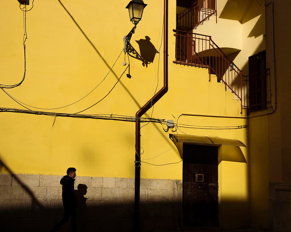 Yellow Wall Shadows by Elena Raceala — canvas wall art