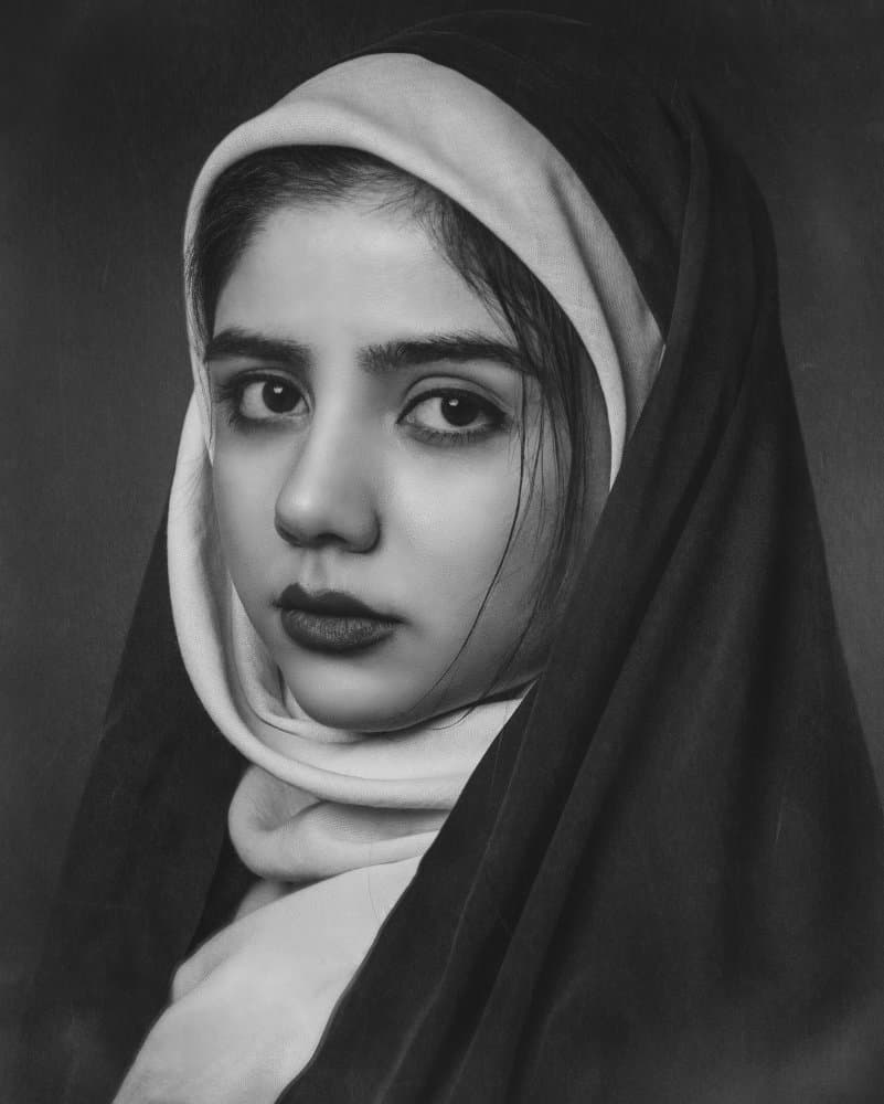 Serene Portrait in Black by Amir Heydari — canvas wall art