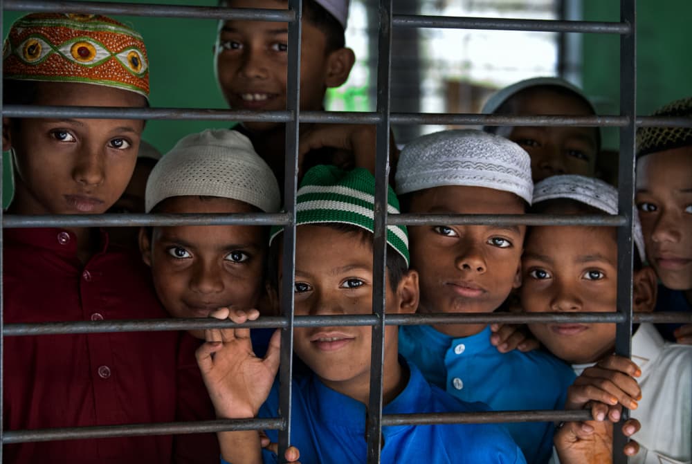 Young Muslim Faces by Joxe Inazio Kuesta Garmendia — canvas wall art
