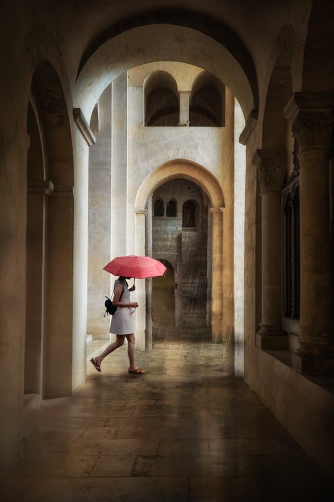 Red Umbrella Archway Walk by Charlaine Gerber — canvas wall art