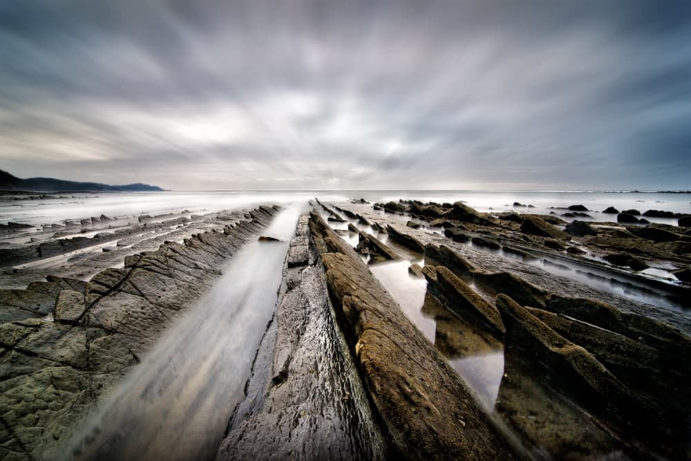 Serene Coastal Flow by Fran Osuna — canvas wall art