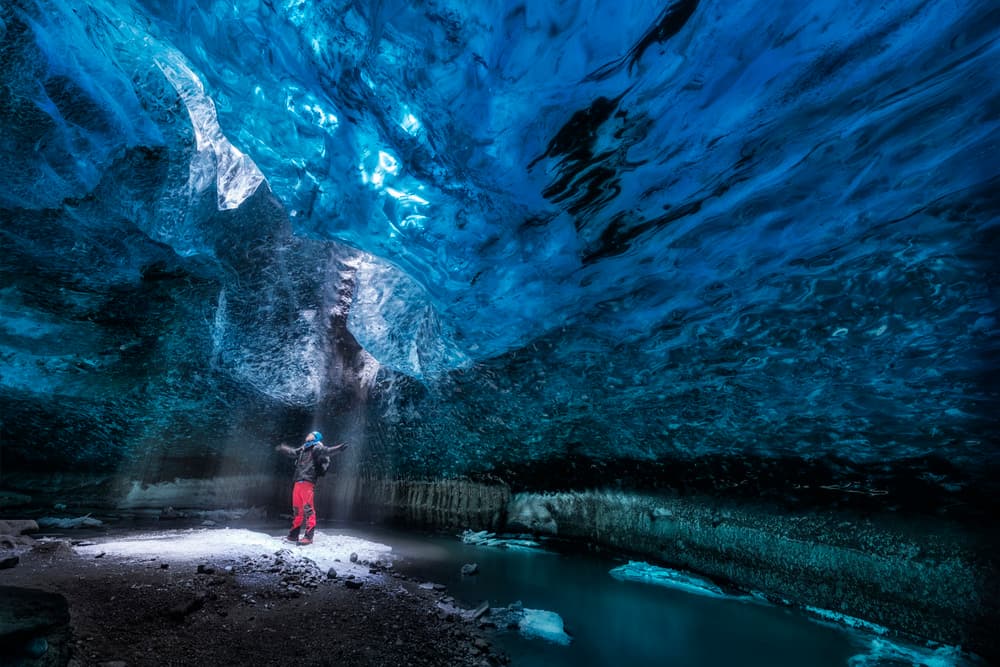 Glacier Cave Explorer by David Martin Castan — canvas wall art