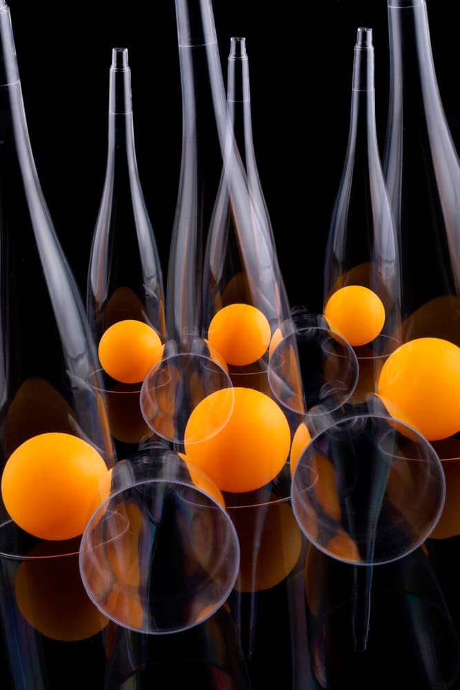 Floating Orange Bottles by Brig Barkow — canvas wall art