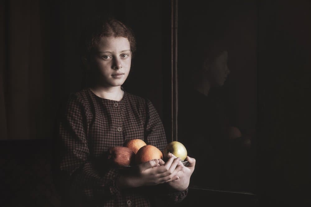 Pensive Girl And Fruit by Emel Sefer — canvas wall art