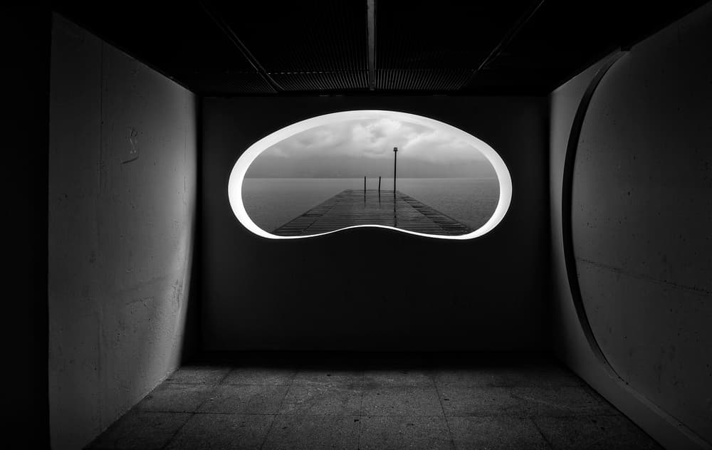Moody Pier Window View by Wim Schuurmans — canvas wall art