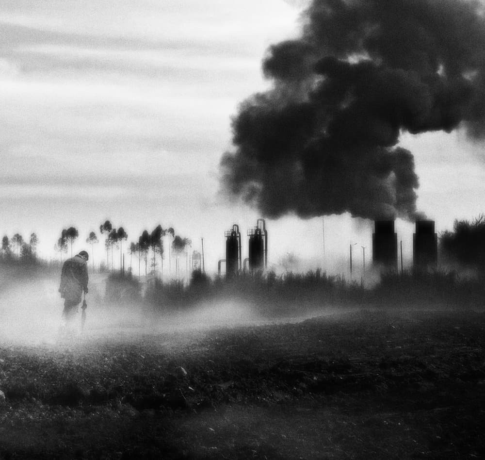 Man By Smoking Factory by Hari Sulistiawan — canvas wall art