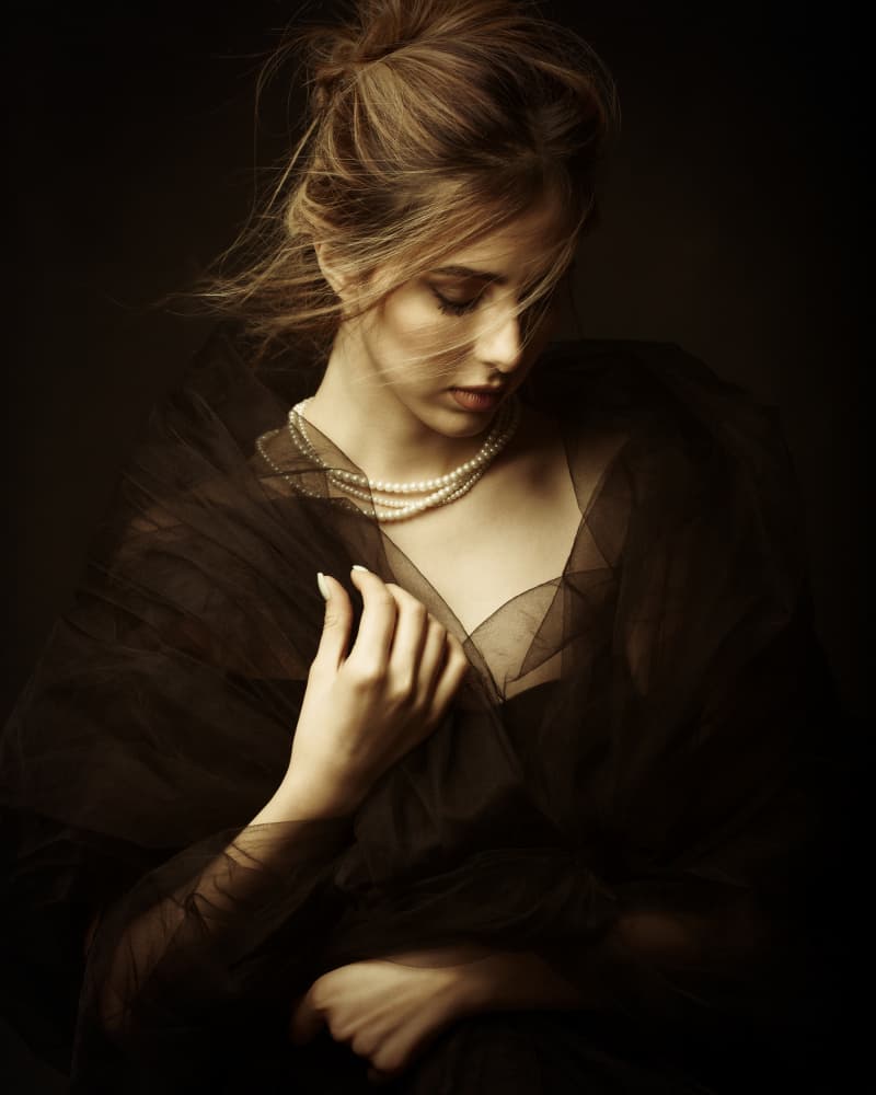 Pensive Woman with Pearls by Mehdi Mokhtari — canvas wall art